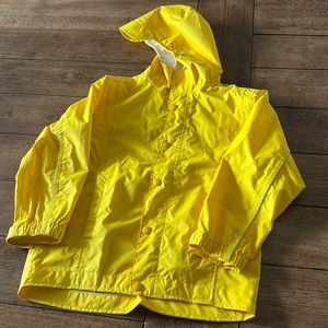 Yellow REI rain jacket can be boys or girls. Size small (6/7)